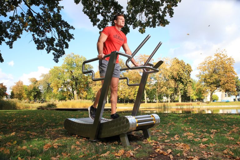 Person performing sprint training on iGreenMill City treadmill